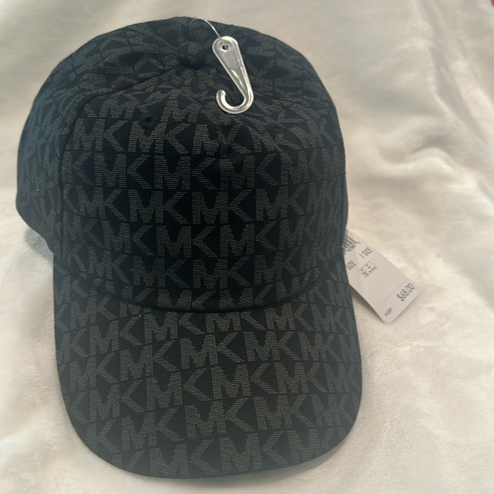 NWT Michael Kors Signature Monogram fabric gray/black cap with adjustable back.